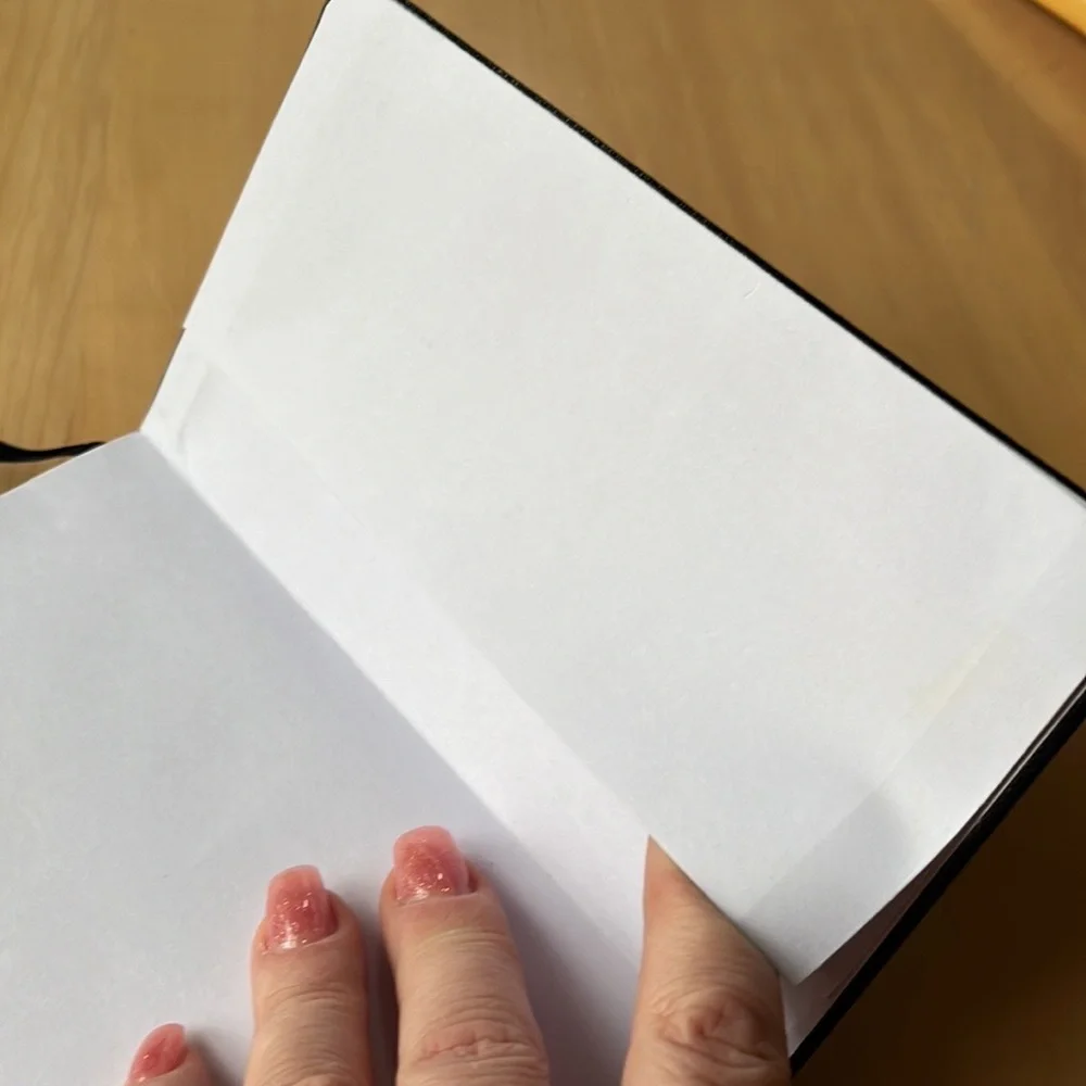 Black leather hard cover notebook for writing or drawing